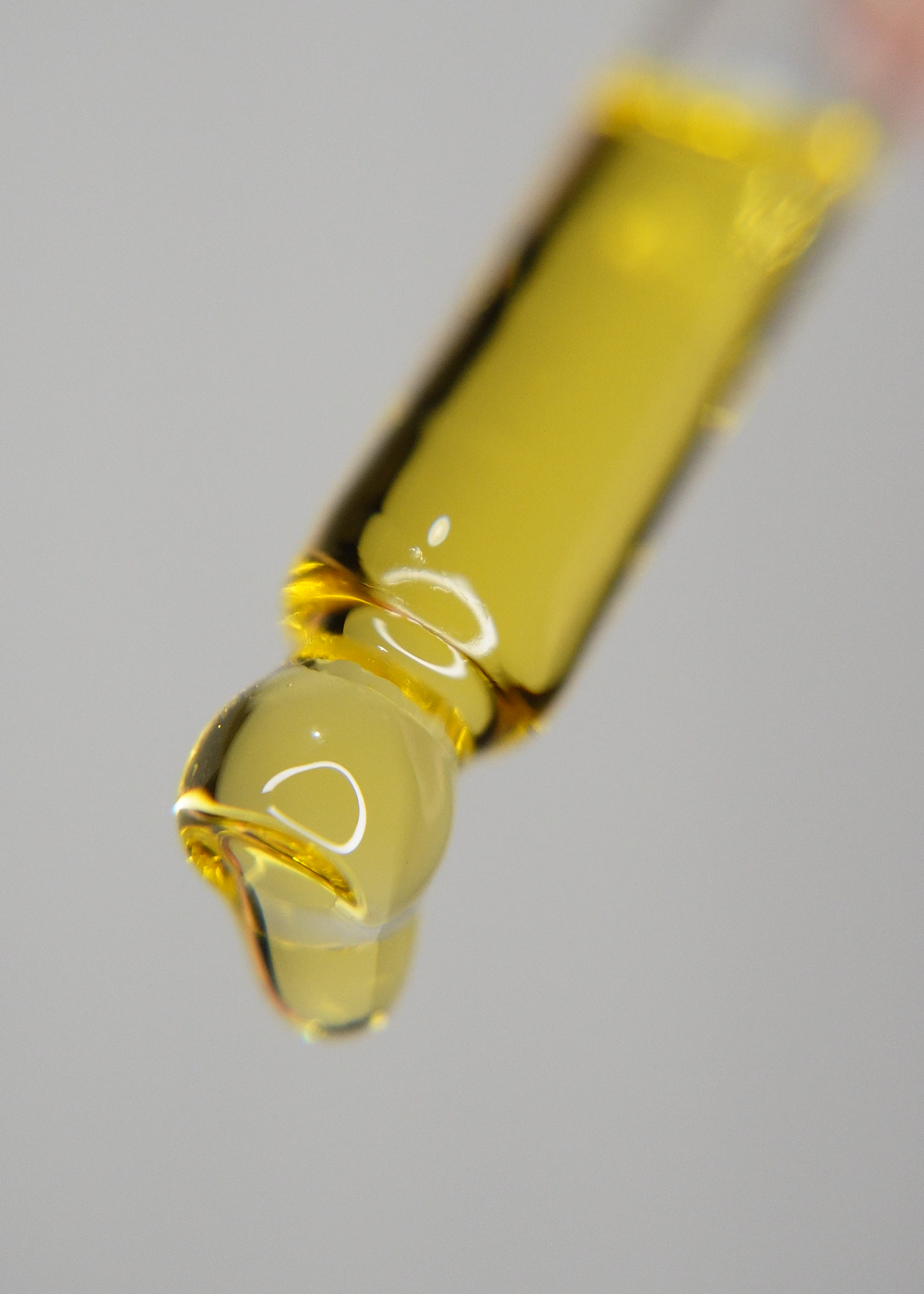 oil dropper with golden face oil
